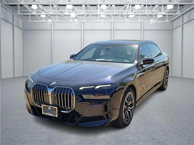 Used 2023 Carbon Black Metallic BMW i xDrive All-Wheel Drive image 1