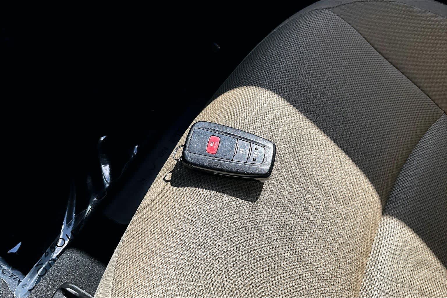 Used 2021 Sea Glass Pearl Toyota LE image 14