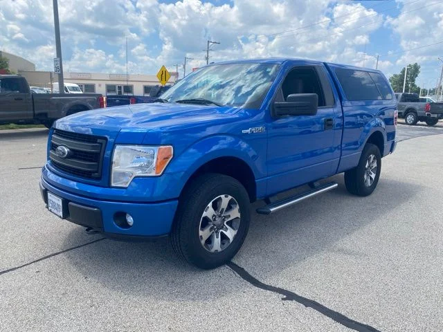 Used 2013 Blue Flame Metallic Ford STX image 2