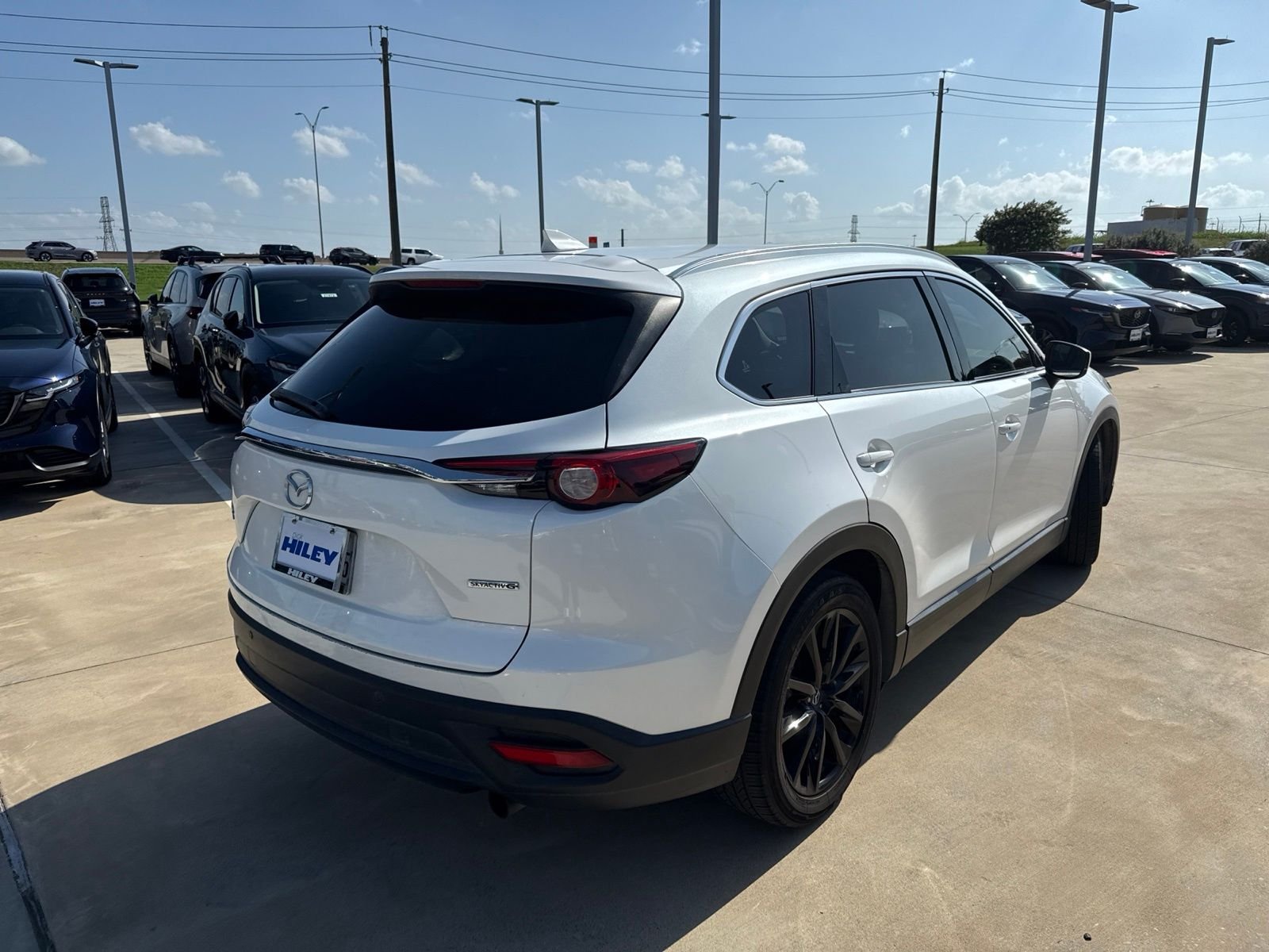 Used 2022 Snowflake White Pearl Mica Mazda Touring Plus image 4