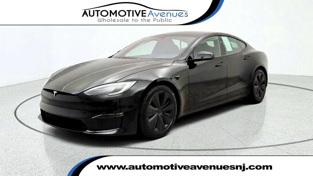 Used 2023 Solid Black Tesla Plaid AWD w/ Yoke Steering Wheel image 1