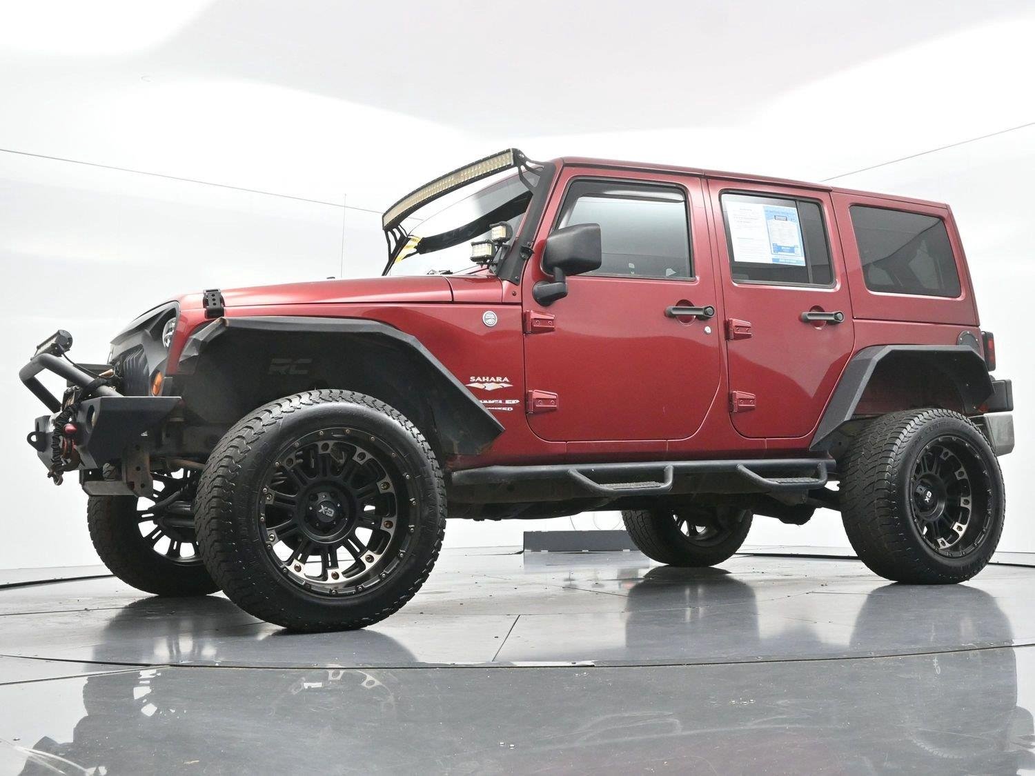 Used 2011 Deep Cherry Red Crystal Pearlcoat Jeep Sahara image 46