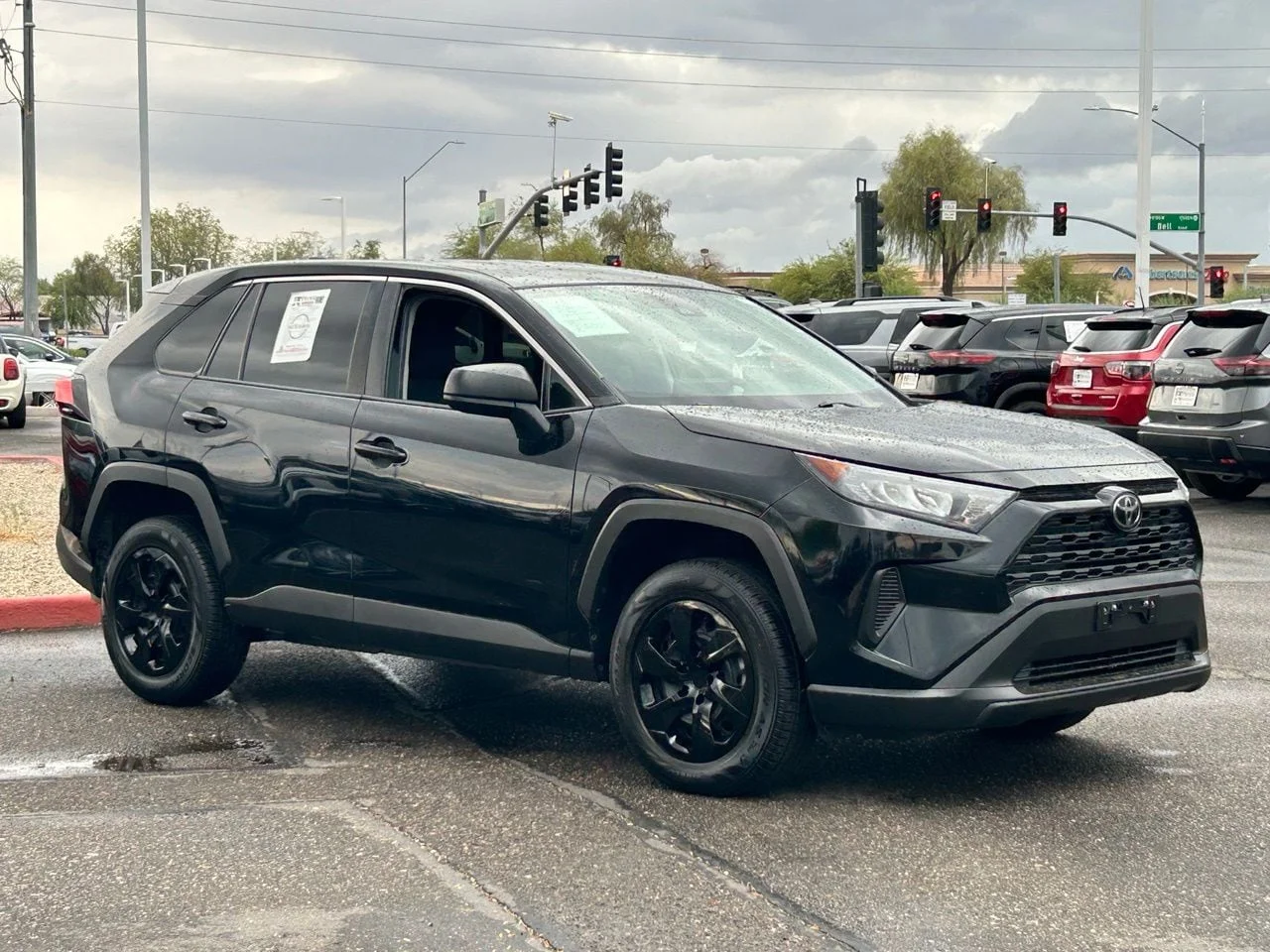 Used 2022 Midnight Black Metallic Toyota LE image 7