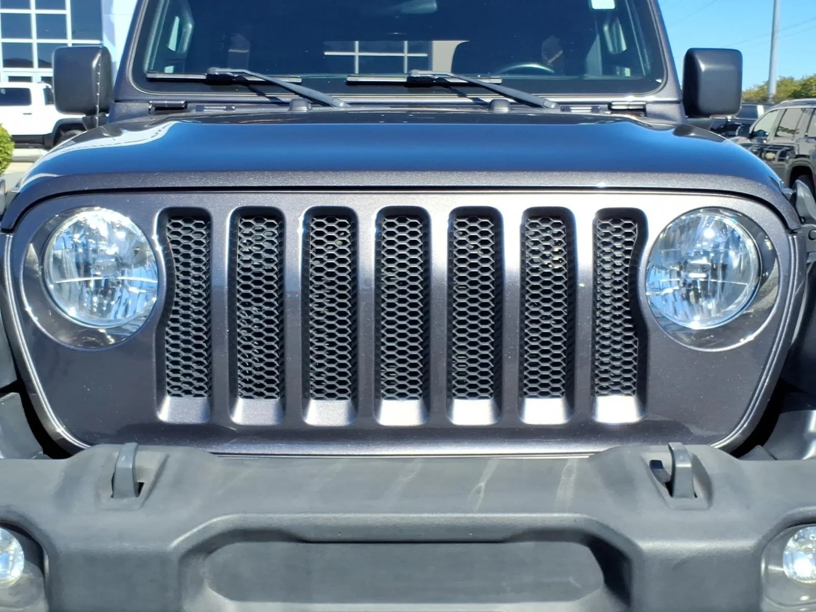 Used 2020 Granite Crystal Metallic Clearcoat Jeep Sport S image 15