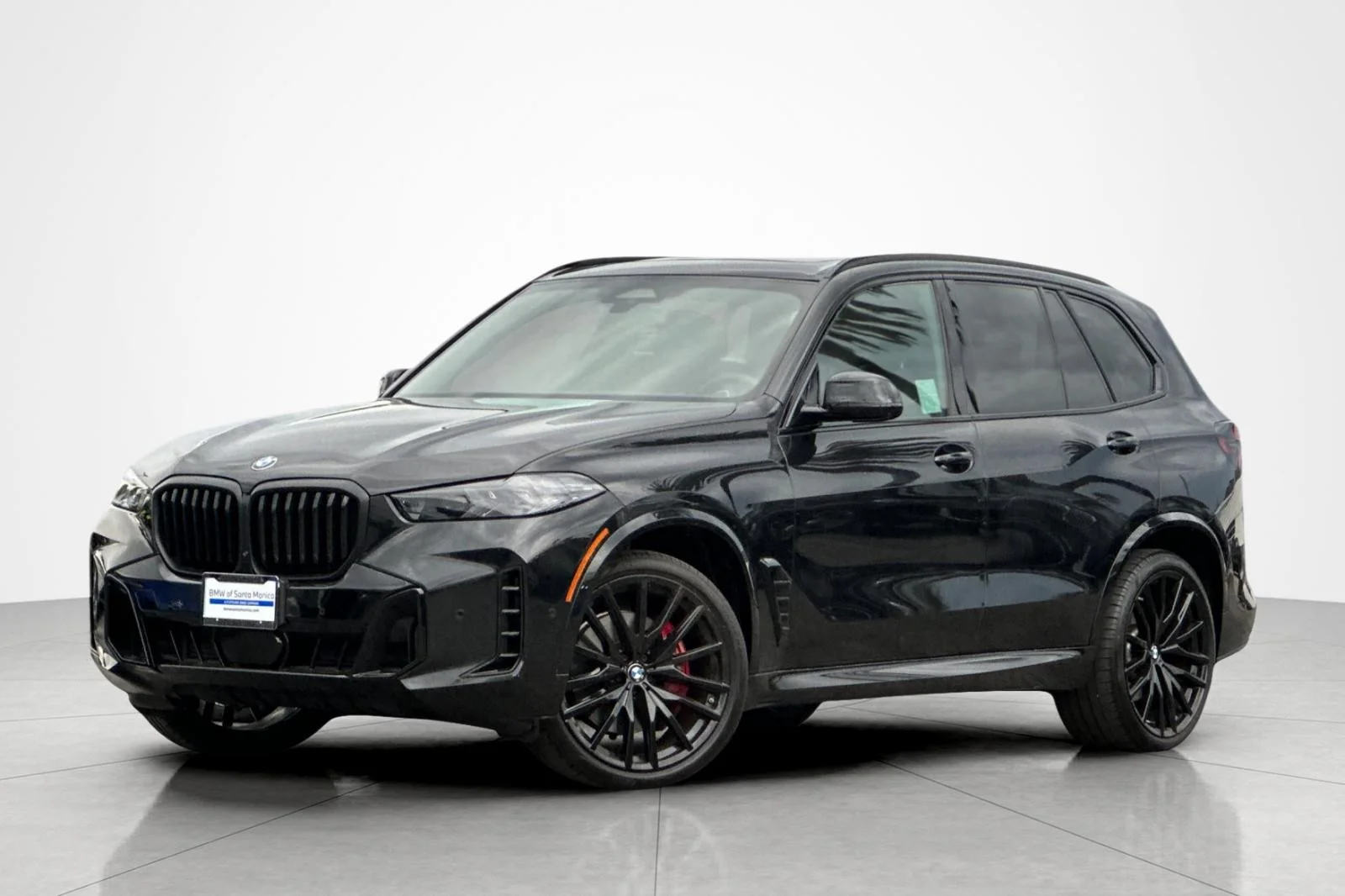 Used 2025 Black Sapphire Metallic BMW sDrive40i image 1