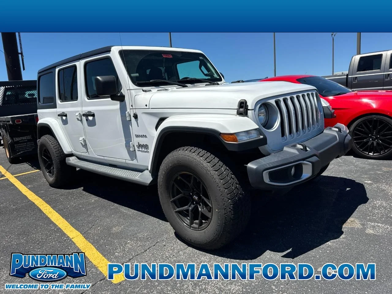 Used 2019 Bright White Clearcoat Jeep Sahara 4x4 image 1