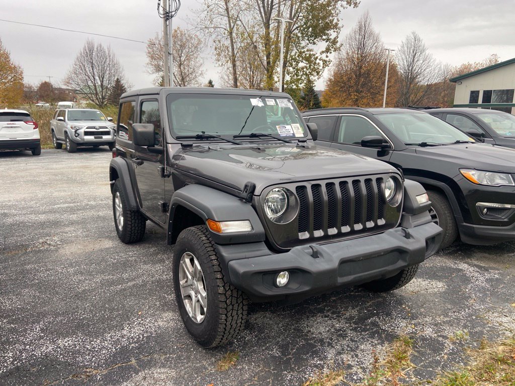 Used 2021 Granite Crystal Metallic Clearcoat Jeep Sport S image 1