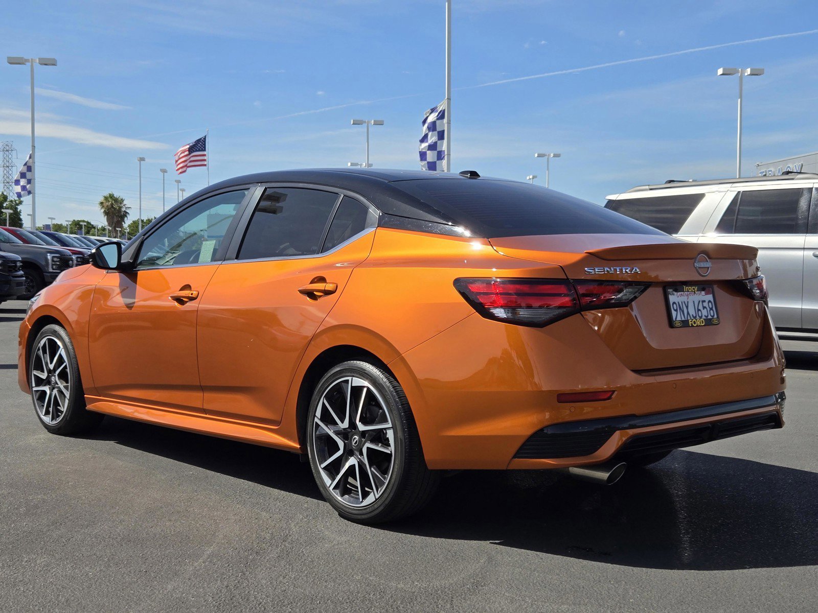 Used 2024 Monarch Orange Metallic/Super Black Nissan SR image 6