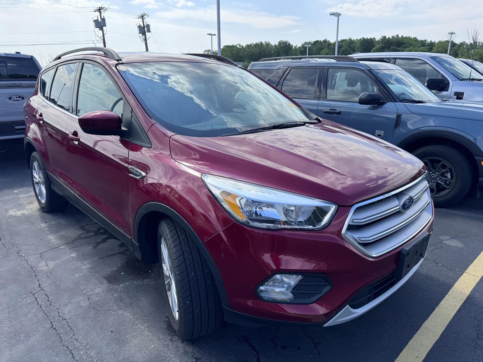Used 2018 Ruby Red Metallic Tinted Clearcoat Ford SE image 3