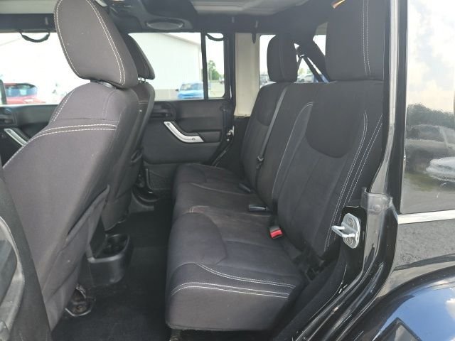Used 2013 Black Jeep Unlimited Sahara image 14