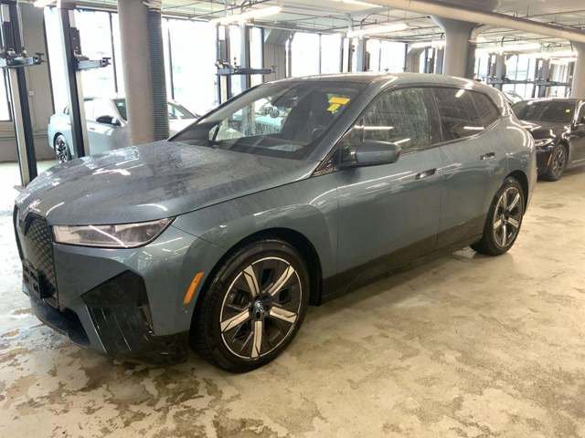Used 2023 Blue BMW xDrive50 image 1