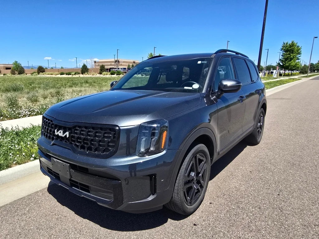 Used 2024 Gravity Gray Kia EX X-Line image 1