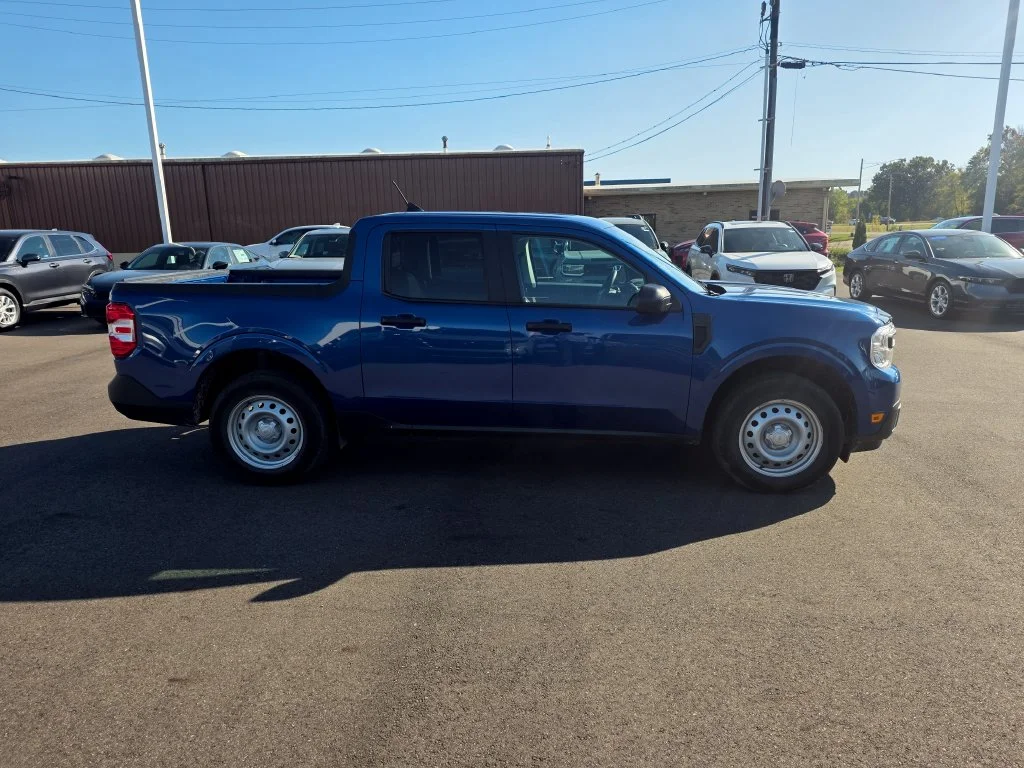 Used 2024 Blue Metallic Ford XL image 2