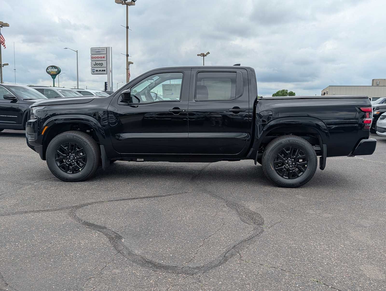 New 2026 Super Black Nissan Crew Cab SV image 4