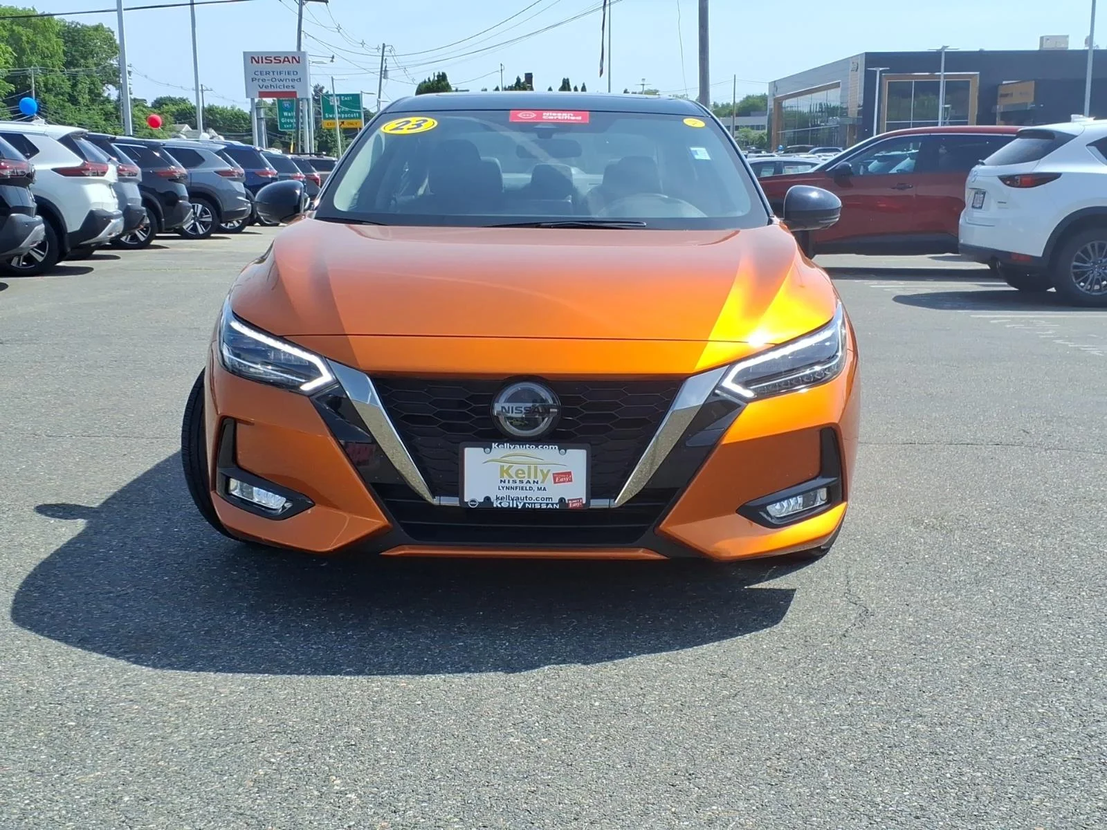 Certified Used 2023 Monarch Orange Metallic/Super Black Nissan SR image 2