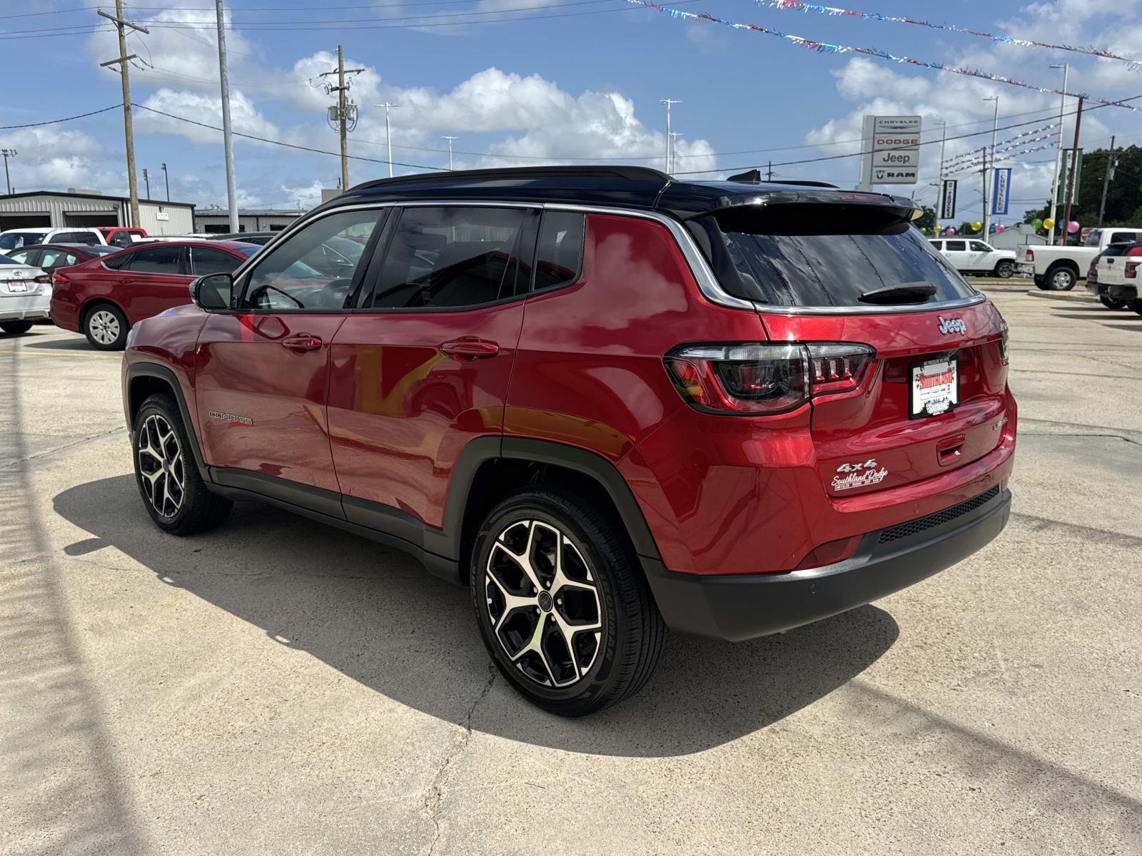 Used 2025 Red Hot Pearlcoat Jeep Limited image 5