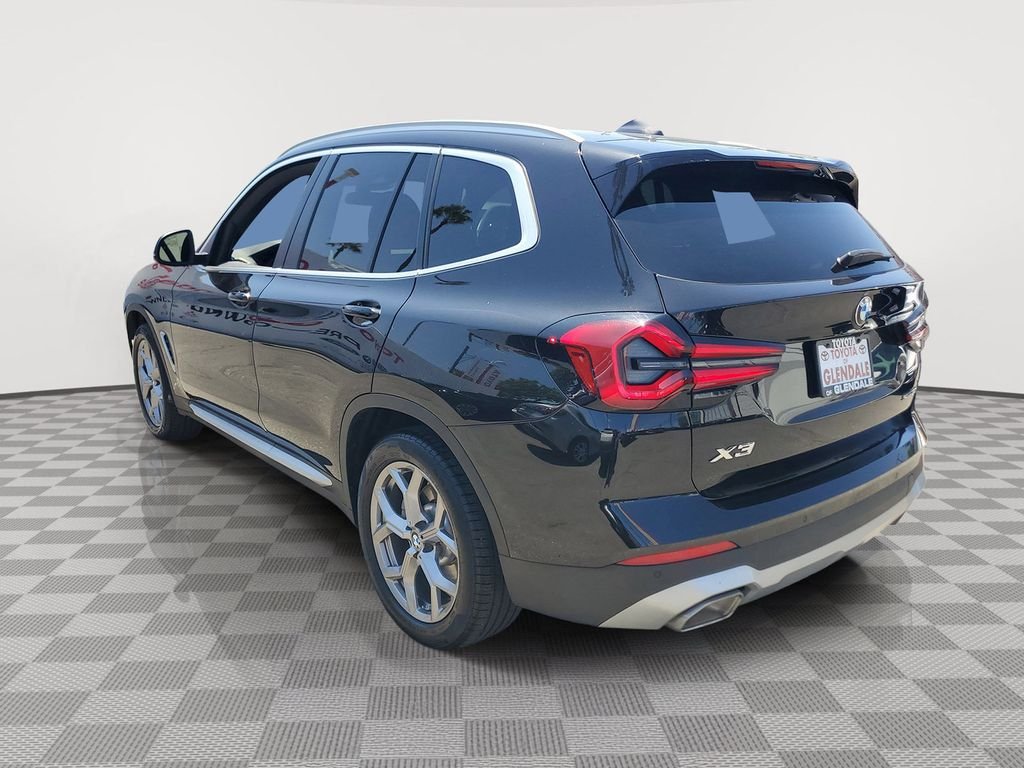 Used 2024 Black Sapphire Metallic BMW sDrive30i image 3