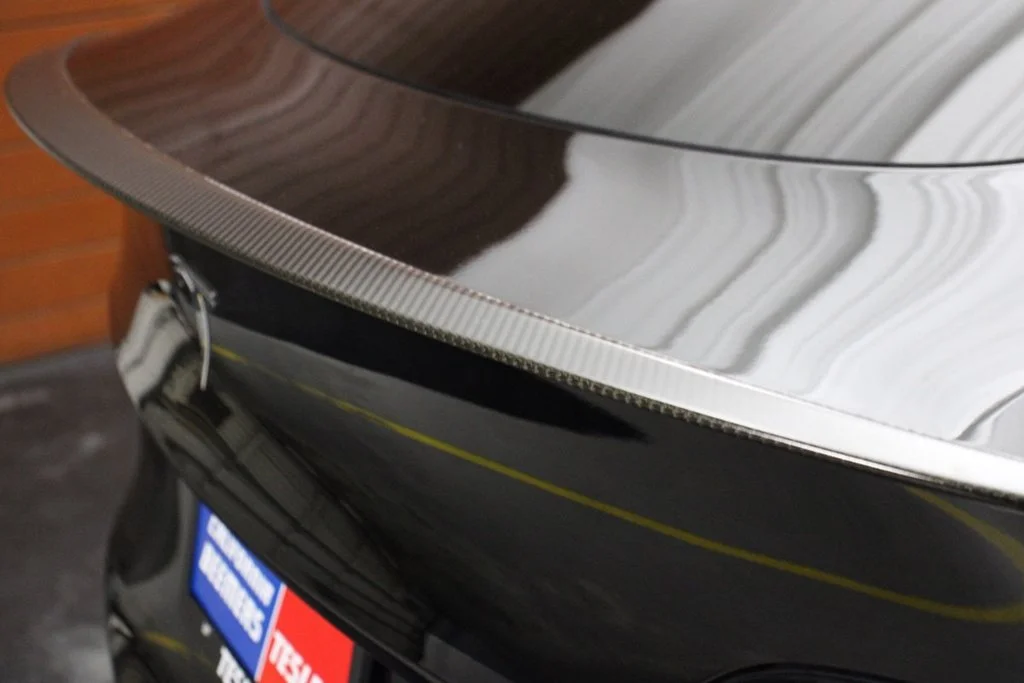 Used 2022 Solid Black Tesla Performance image 8