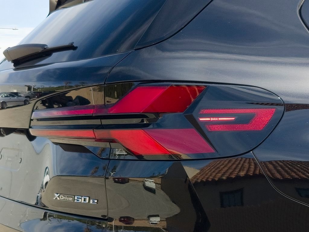 New 2026 Black Sapphire Metallic BMW xDrive50e image 4