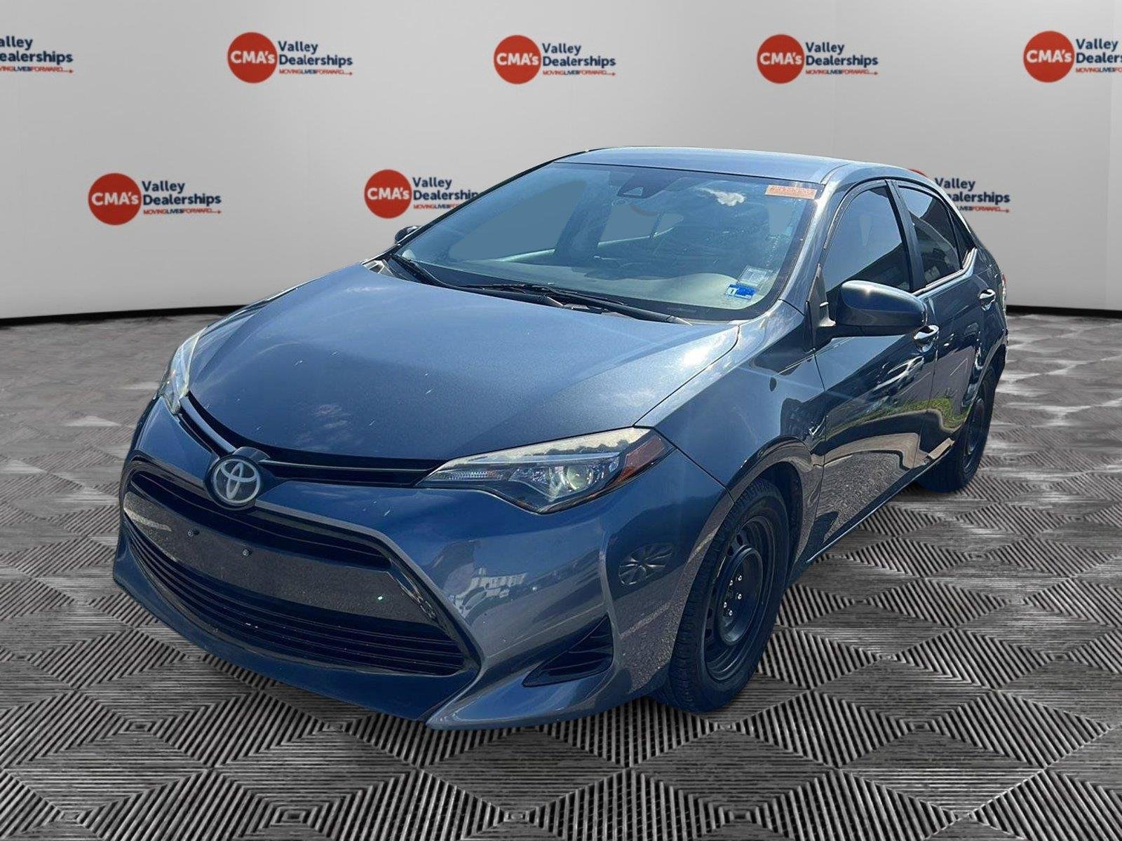 Used 2017 Slate Metallic Toyota LE image 1