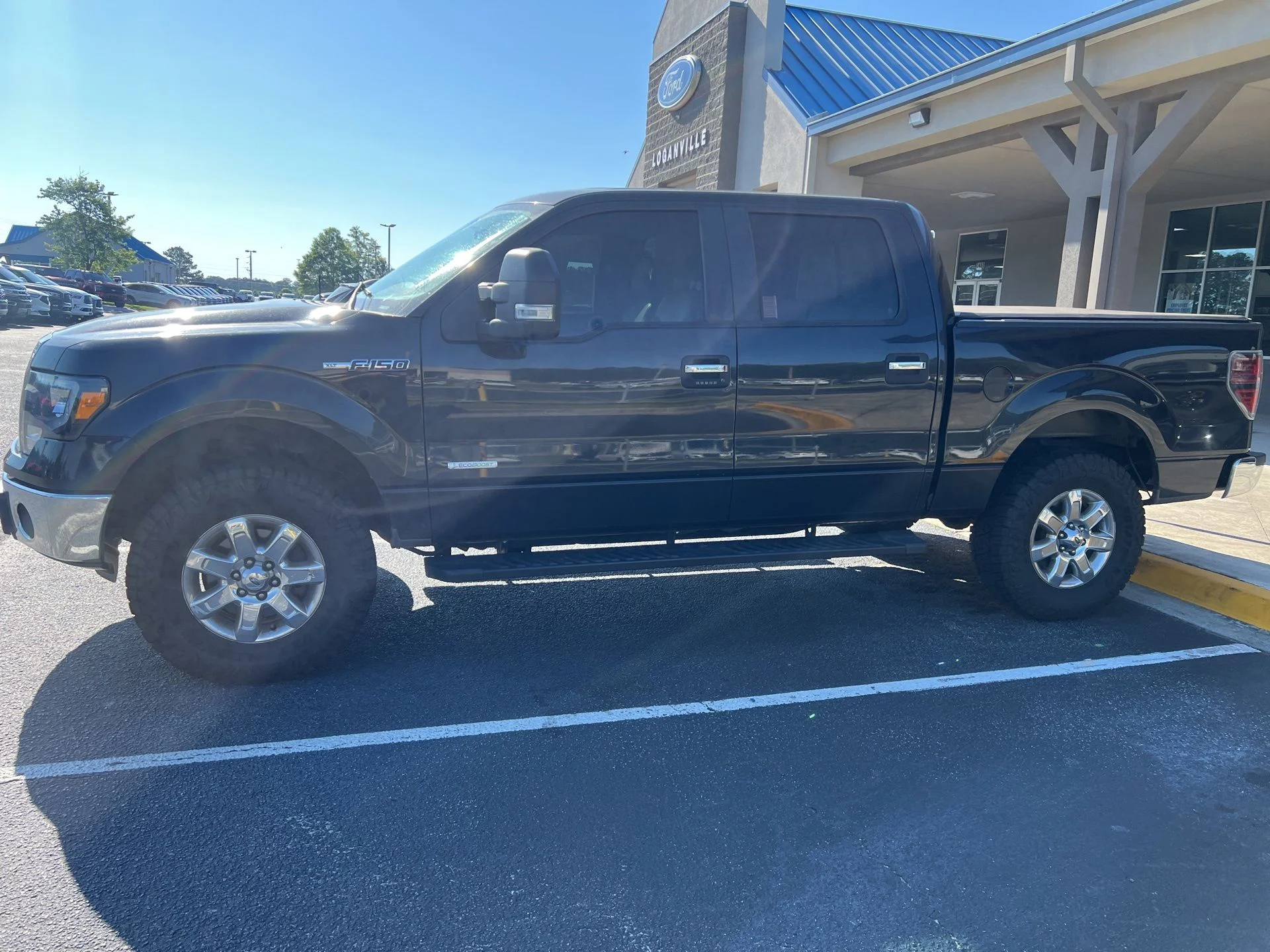 Used 2014 Tuxedo Black Metallic Ford XLT W/Leather image 2