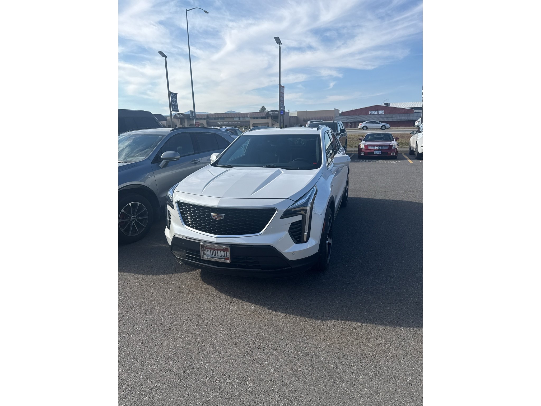 Used 2023 CRYSTAL WHITE TRICOAT Cadillac AWD Sport image 1