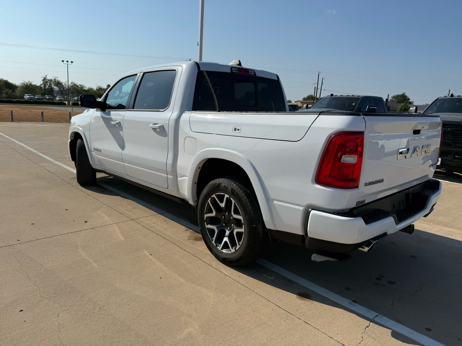 Used 2025 Bright White Clearcoat Ram Laramie image 8