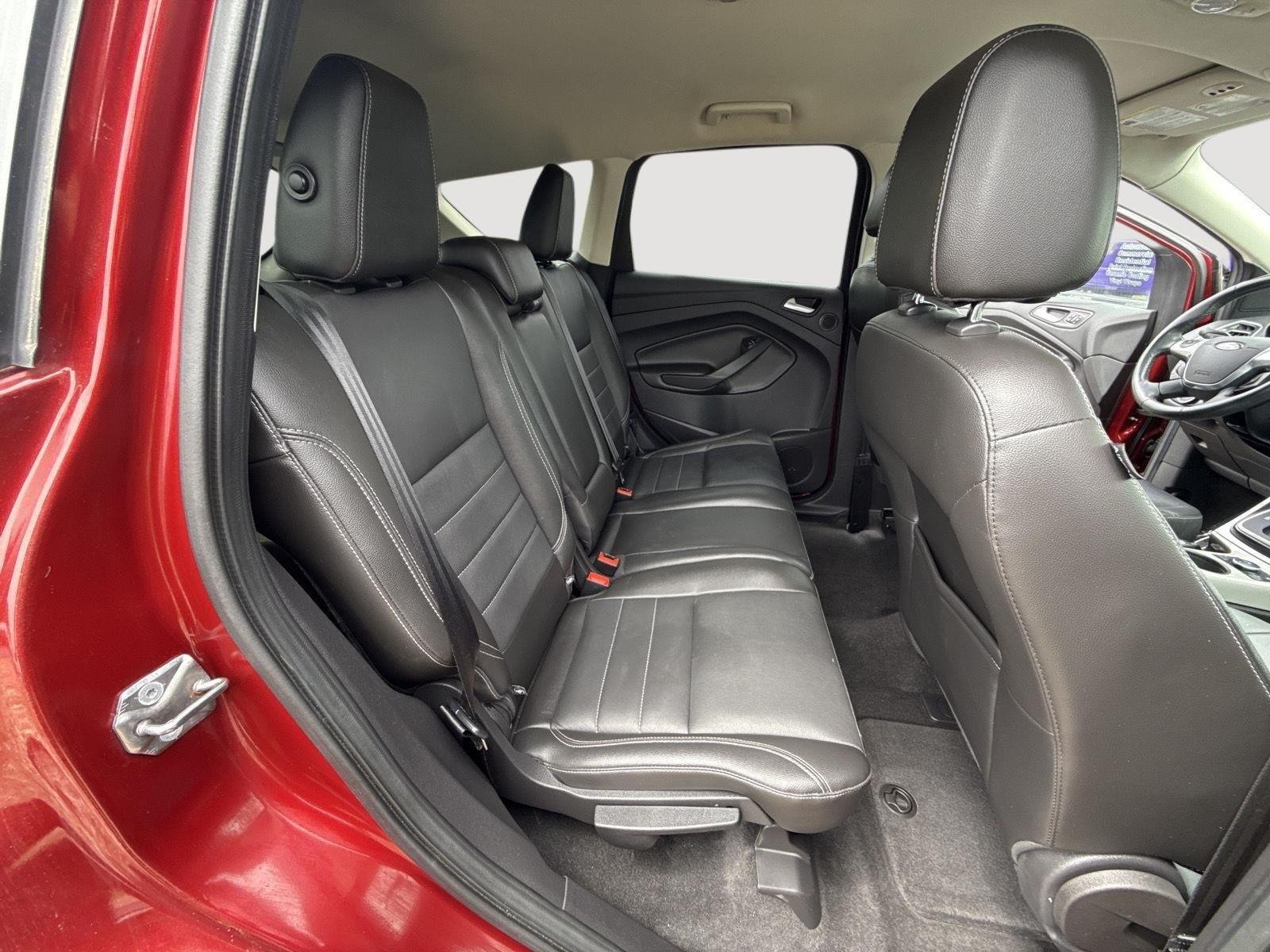 Used 2013 Ruby Red Metallic Tinted Clear Coat Ford SEL image 5