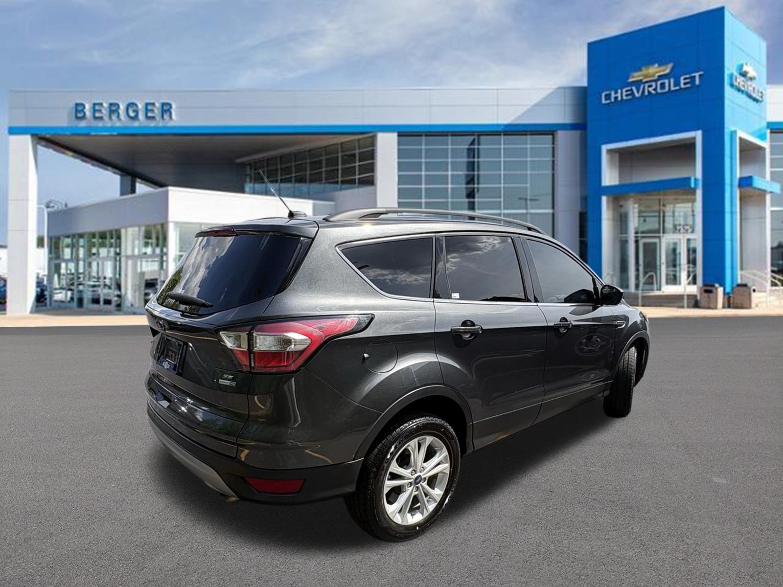 Used 2018 Ford Escape SE with VIN 1FMCU9GD7JUB22505 for sale in Grand Rapids, MI