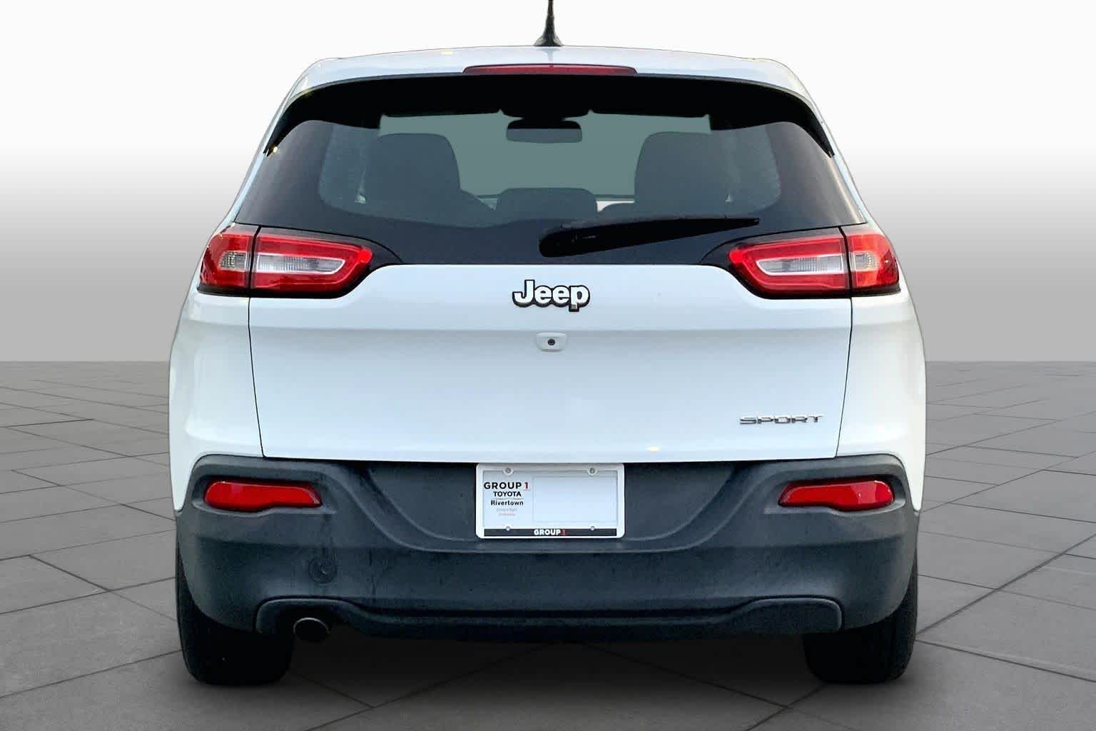 Used 2014 Bright White Clearcoat Jeep Sport image 5