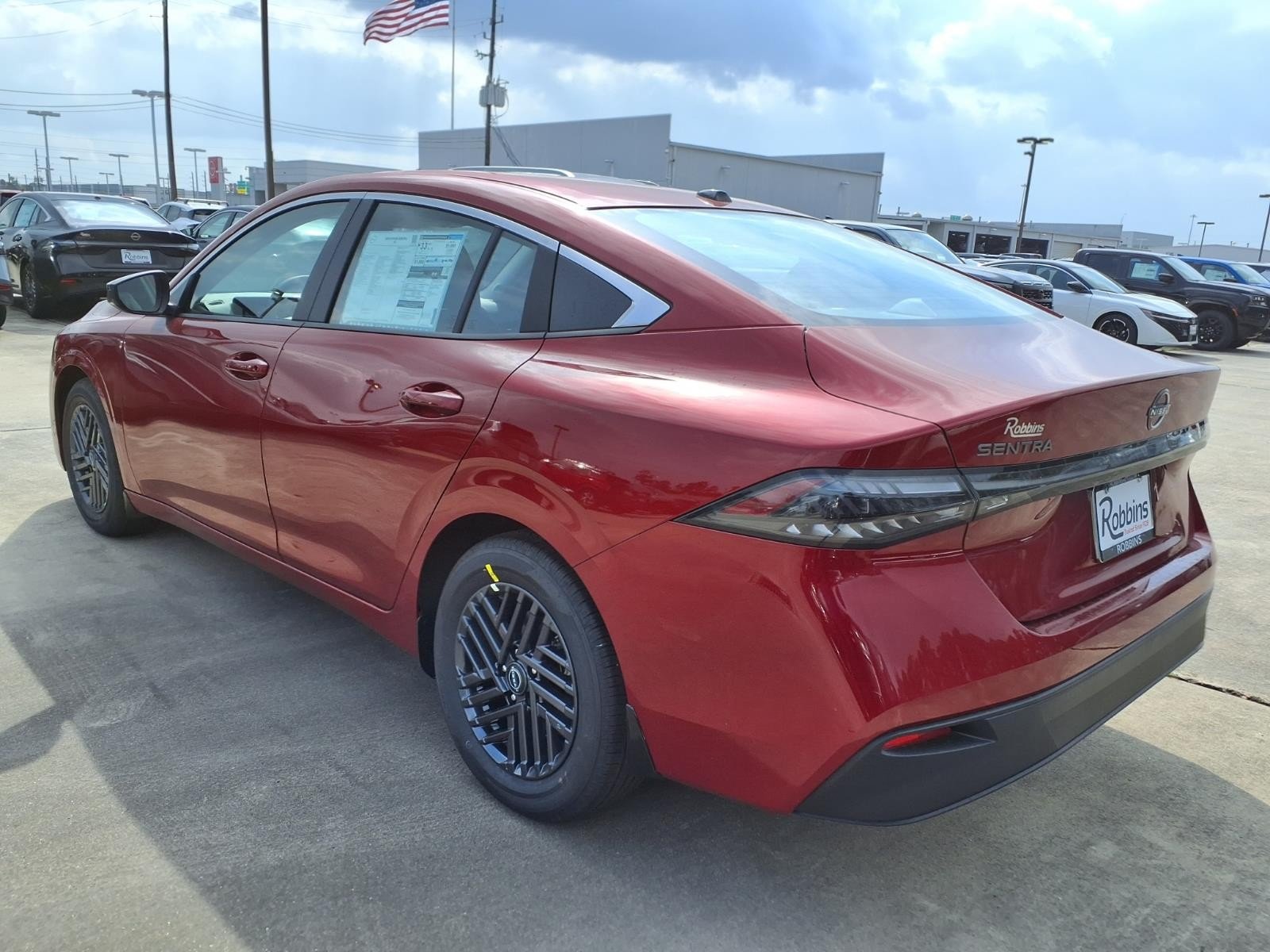 2026 Nissan Sentra SV Red at Robbins Nissan
