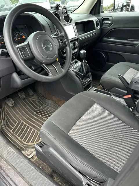 Used 2015 Granite Crystal Clearcoat Metallic Jeep Sport image 11