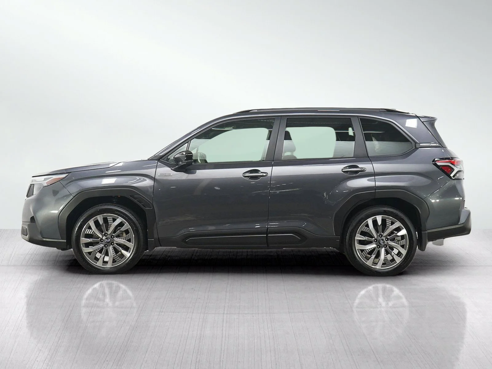 Used 2025 Subaru Forester Touring with VIN JF2SLSTD7SH400587 for sale in Hopkins, Minnesota