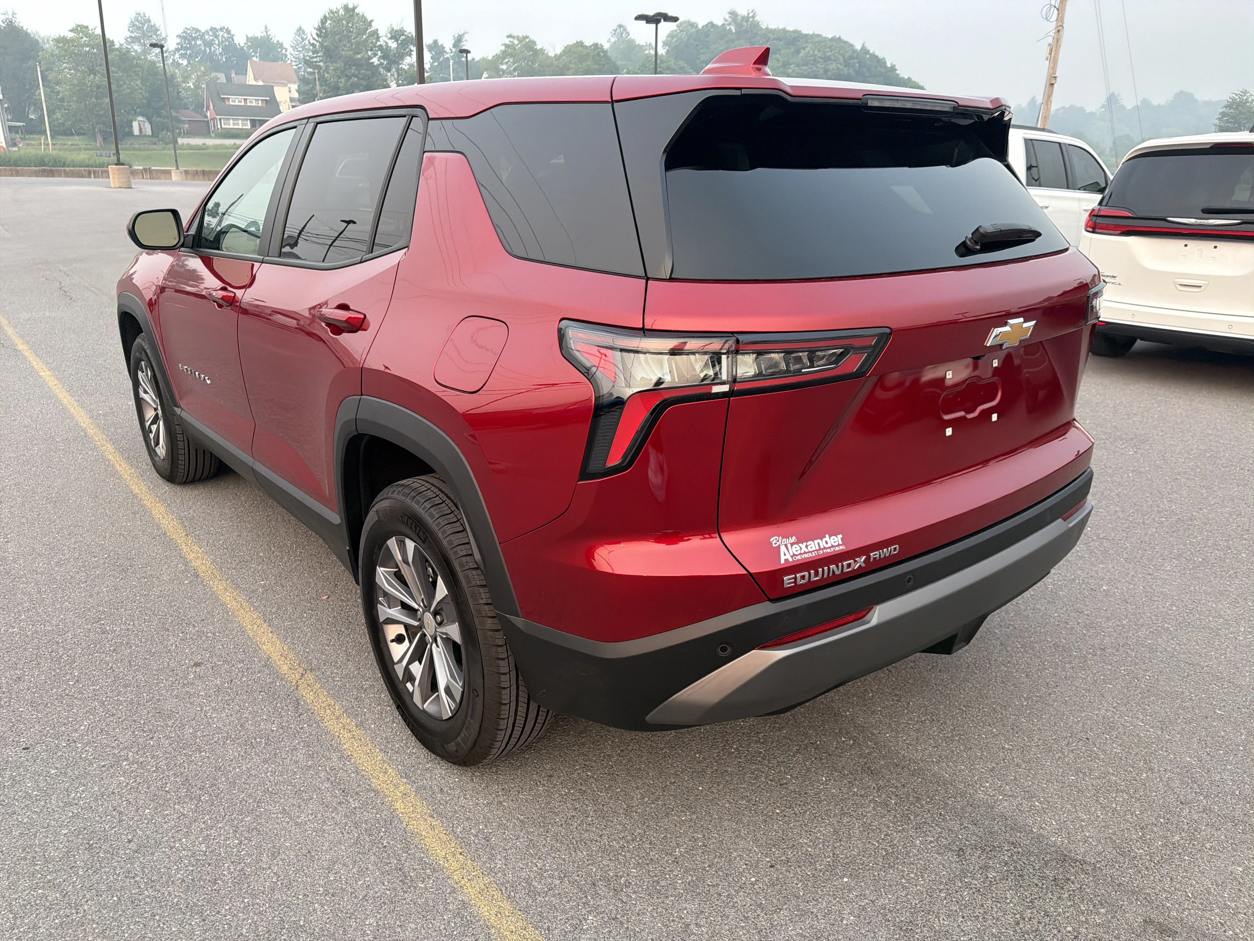 Used 2026 Radiant Red Tintcoat Chevrolet AWD LT image 4