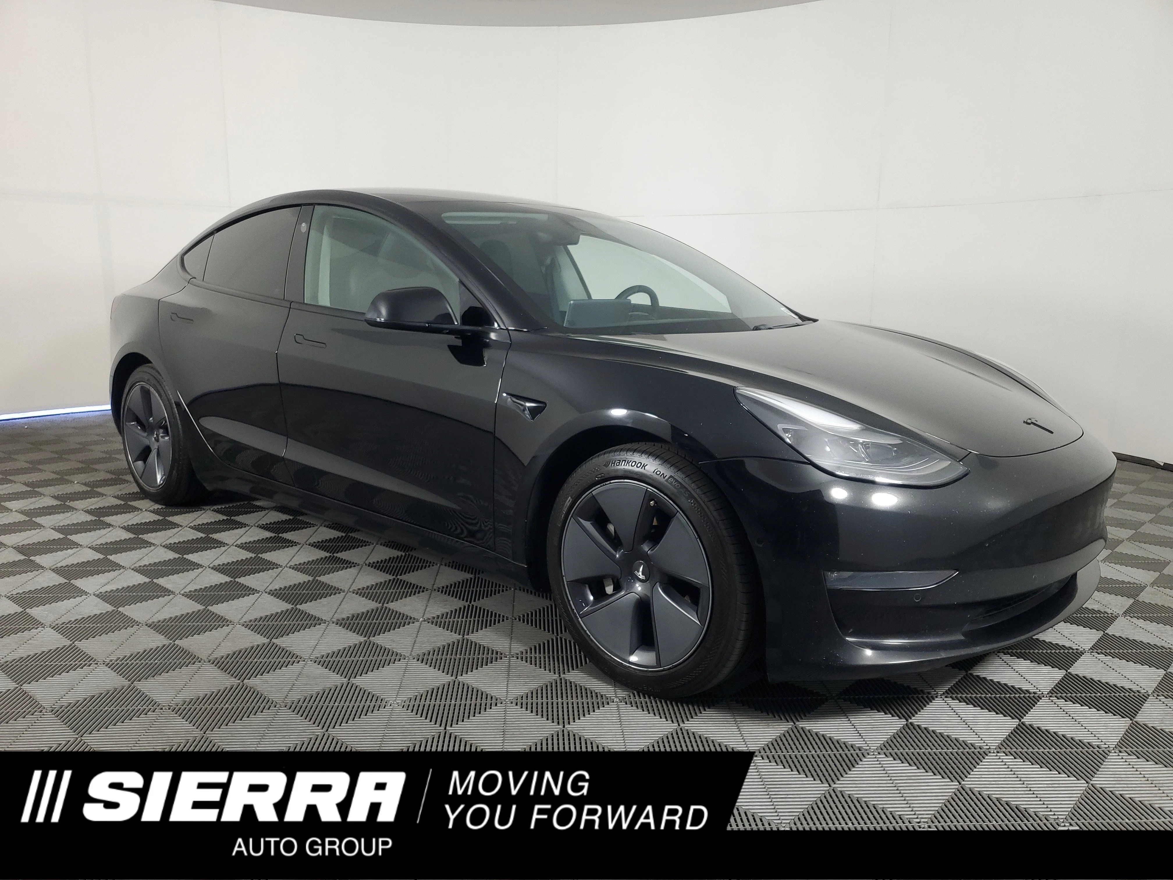 Used 2021 Solid Black Tesla Long Range image 1