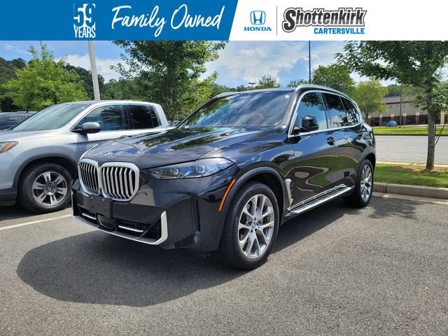 Used 2026 Black BMW xDrive40i image 1