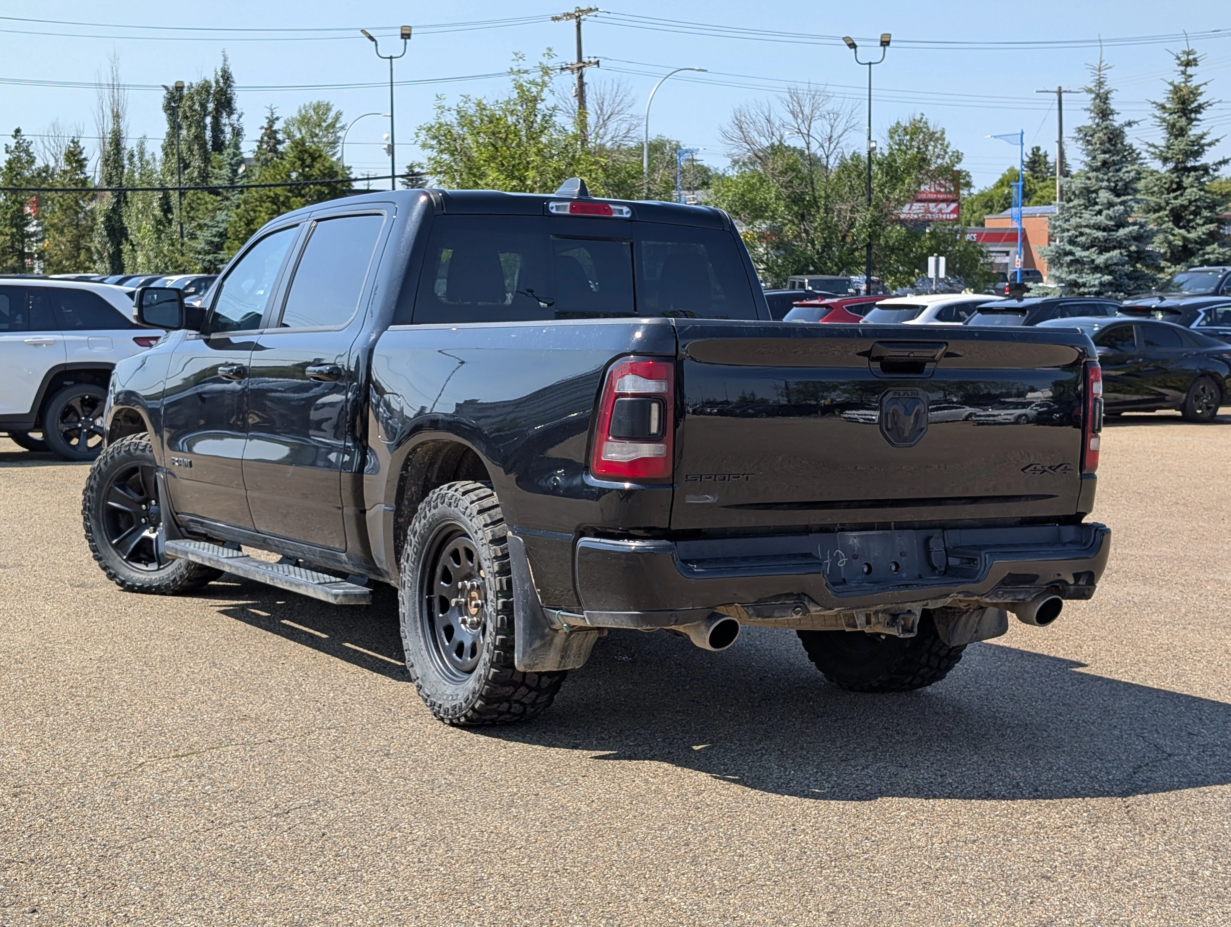 Used 2022 Diamond Black Crystal Pearlcoat Ram Sport image 4