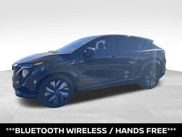 Certified Used 2024 Green Nissan EVOLVE+ e-4ORCE image 3