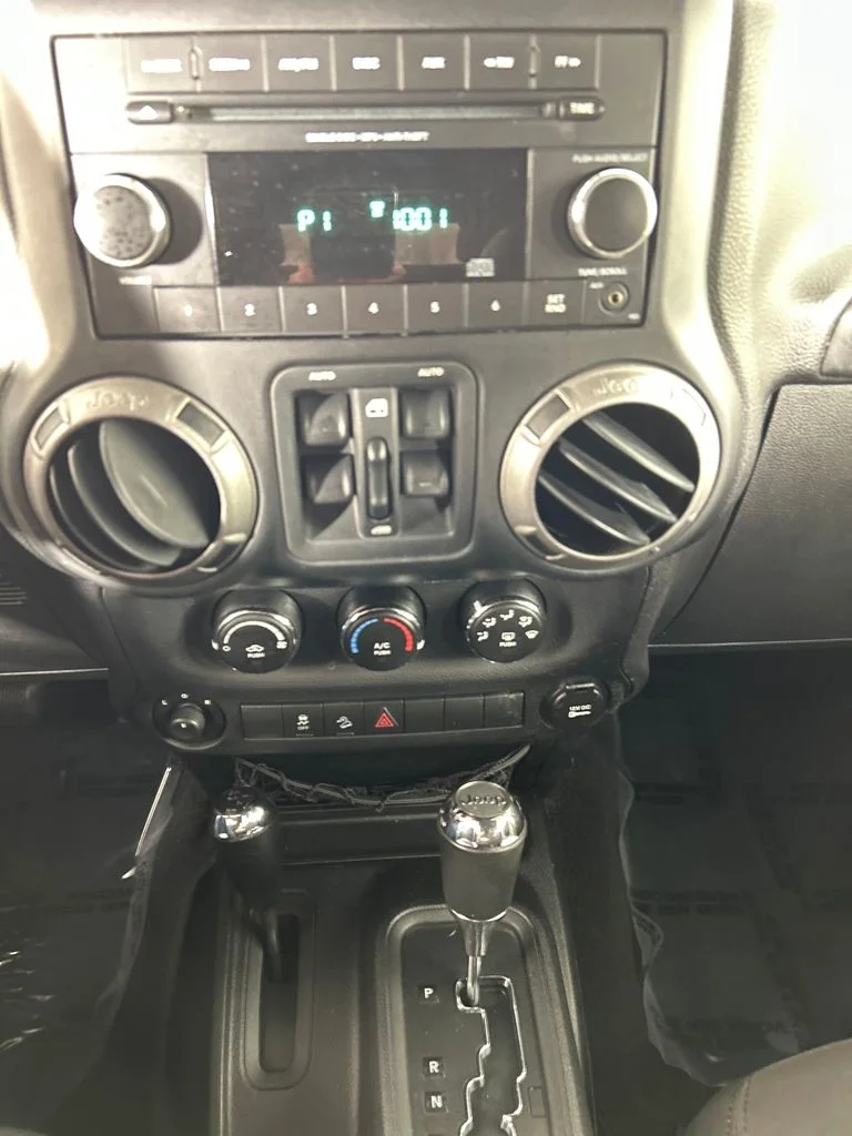Used 2014 Red Jeep Unlimited Sport image 14