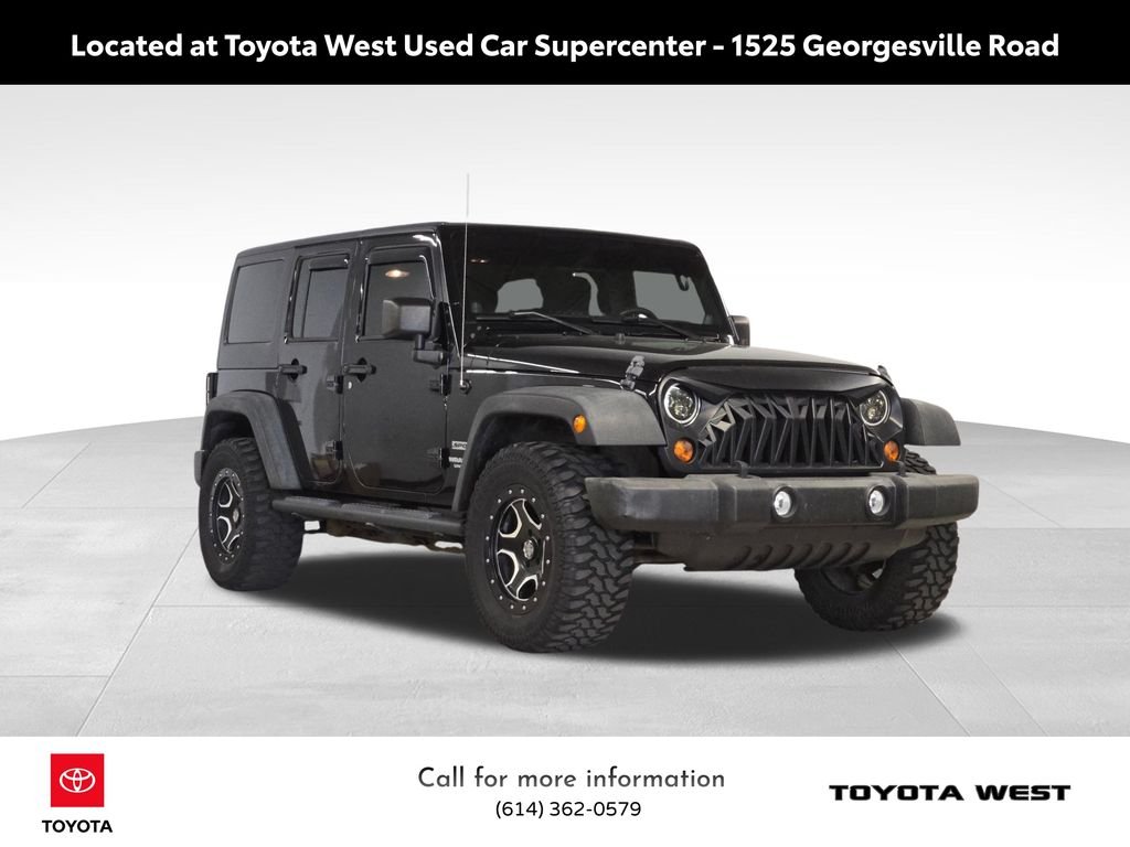 Used 2013 Black Jeep Unlimited Sport image 3