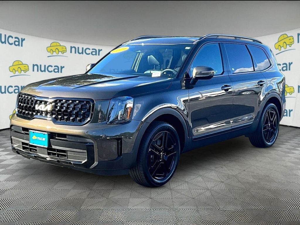 Used 2024 Green Kia EX X-Line image 3