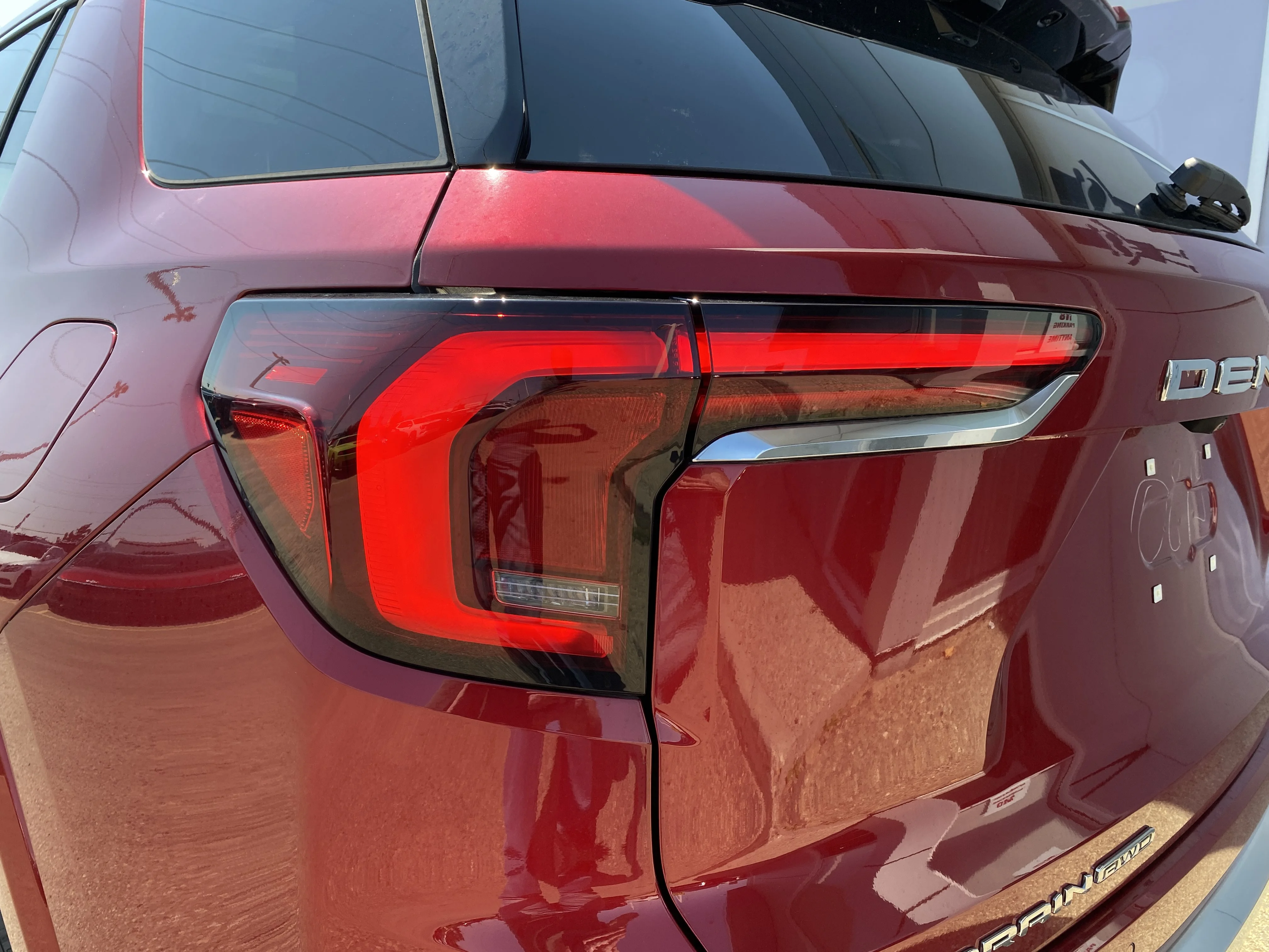 New 2026 VOLCANIC RED TINTCOAT GMC AWD Denali image 11