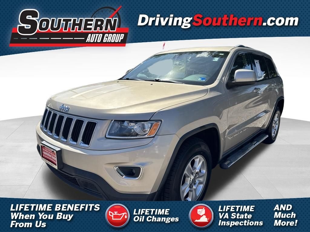 Used 2014 Beige Jeep Laredo image 1
