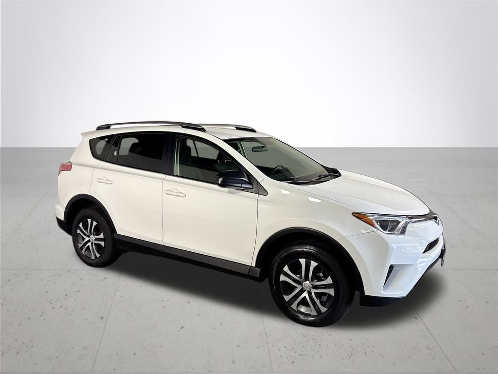 Used 2016 Super White Toyota LE image 4