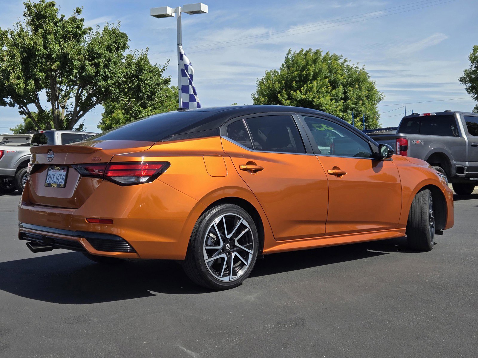 Used 2024 Monarch Orange Metallic/Super Black Nissan SR image 4