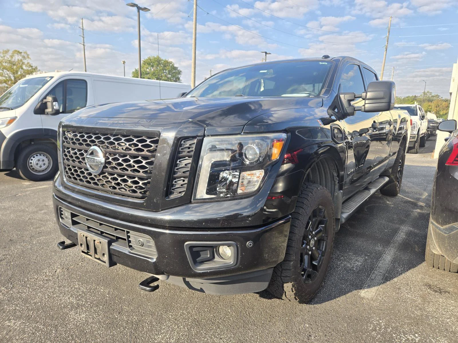 Used 2018 Magnetic Black Nissan SV image 1