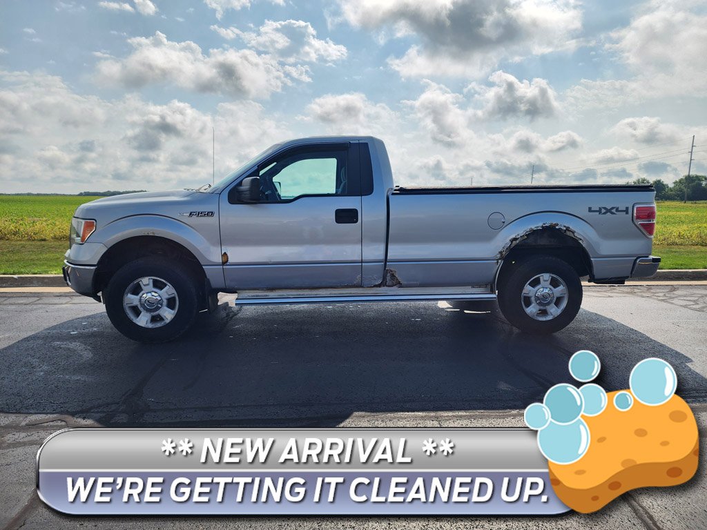 Used 2012 Ingot Silver Metallic Ford XLT image 1