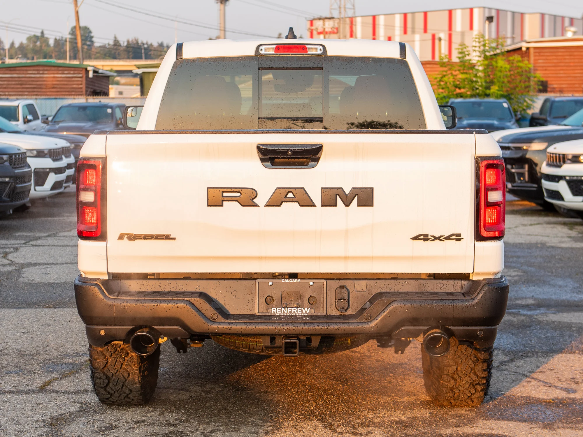 New 2026 White RAM Rebel* Crew Cab 4x4, 33 Inch A/T Tires, Sunroof, Passenger Screen image 5