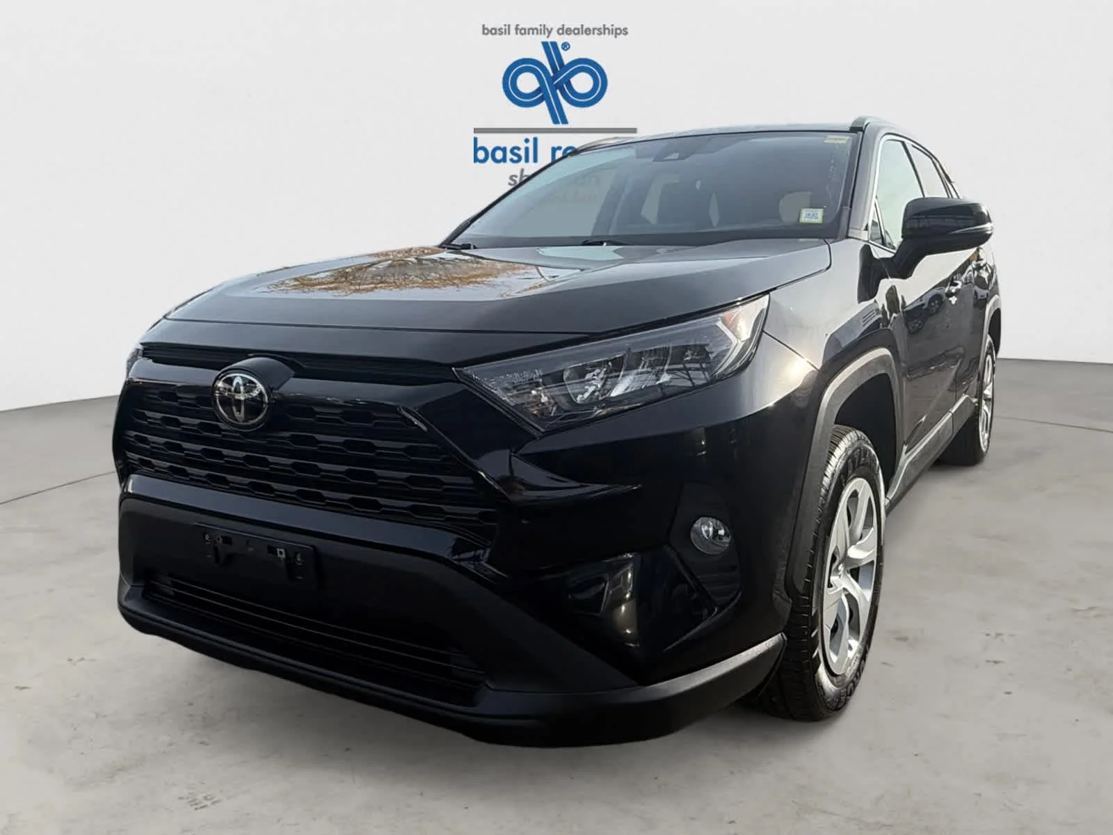 Used 2021 Midnight Black Metallic Toyota LE image 2