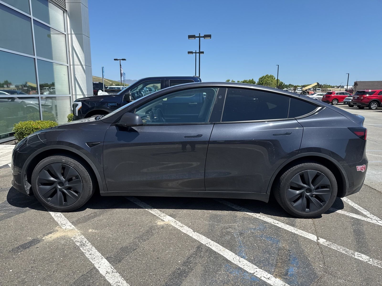 Used 2024 Tesla Model Y Long Range with VIN 7SAYGDED9RF164348 for sale in Livermore, CA